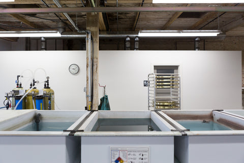 chemical baths to create patina on light fixtures