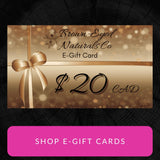 Pink 'Shop E-Gift Cards' button overlaid on a black wooden background with a digital image of a $20 Brown-Eyed Naturals Co E-Gift Card