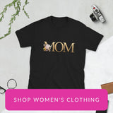 Pink 'Shop Women's Clothing' button overlaid on a black T-Shirt with a Golden Glitter Ombre Floral 'Mom' graphic - Brown-Eyed Naturals Co