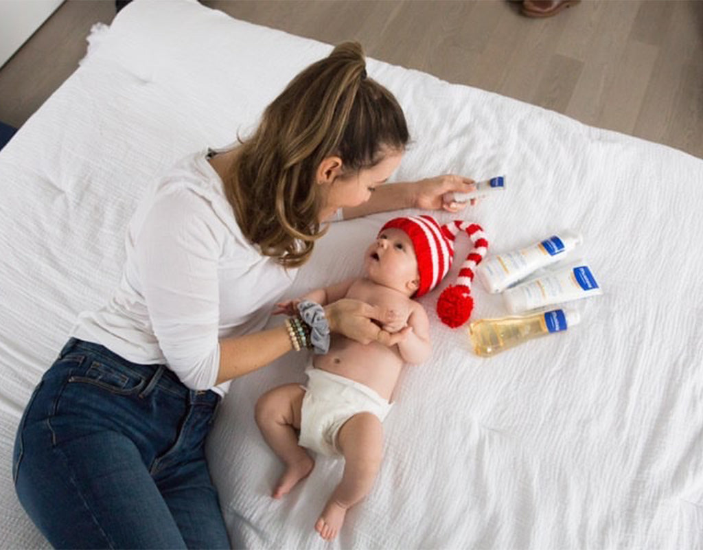 Mom soothing baby during 3-month sleep regression