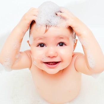 baby scrubbing his hair