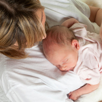 newborn with baby hairloss