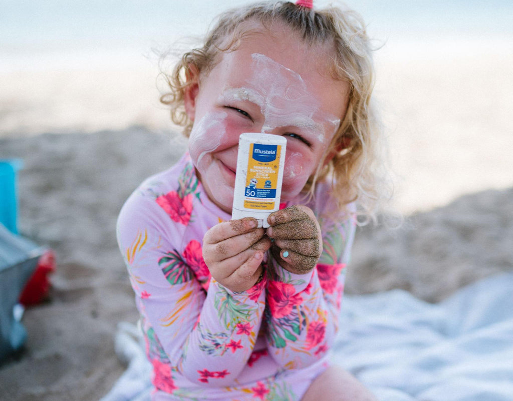 baby sunscreen on toddlers face