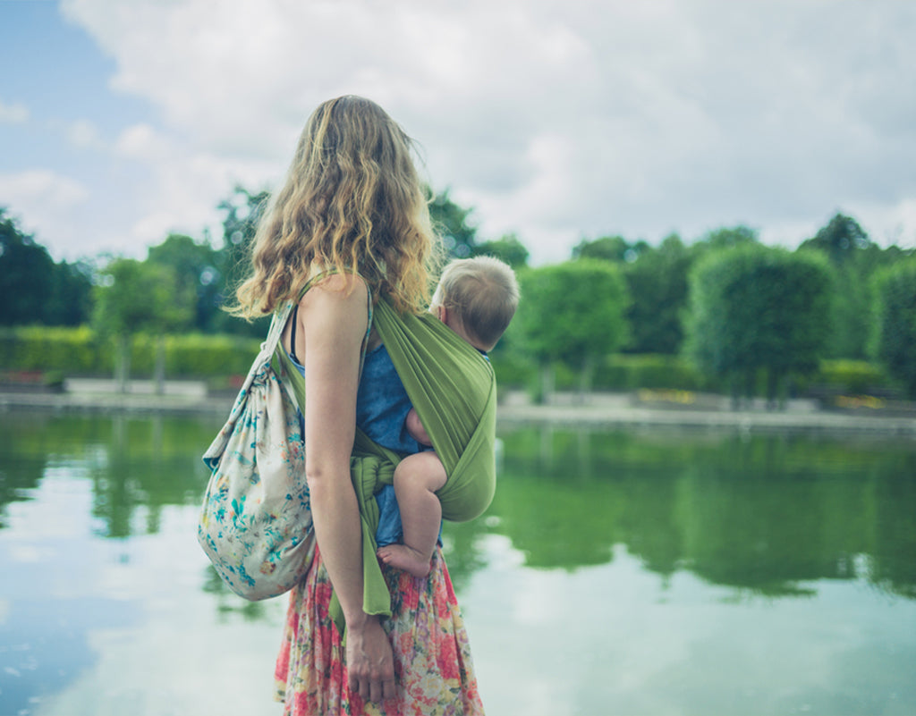 Mom with baby travel essentials