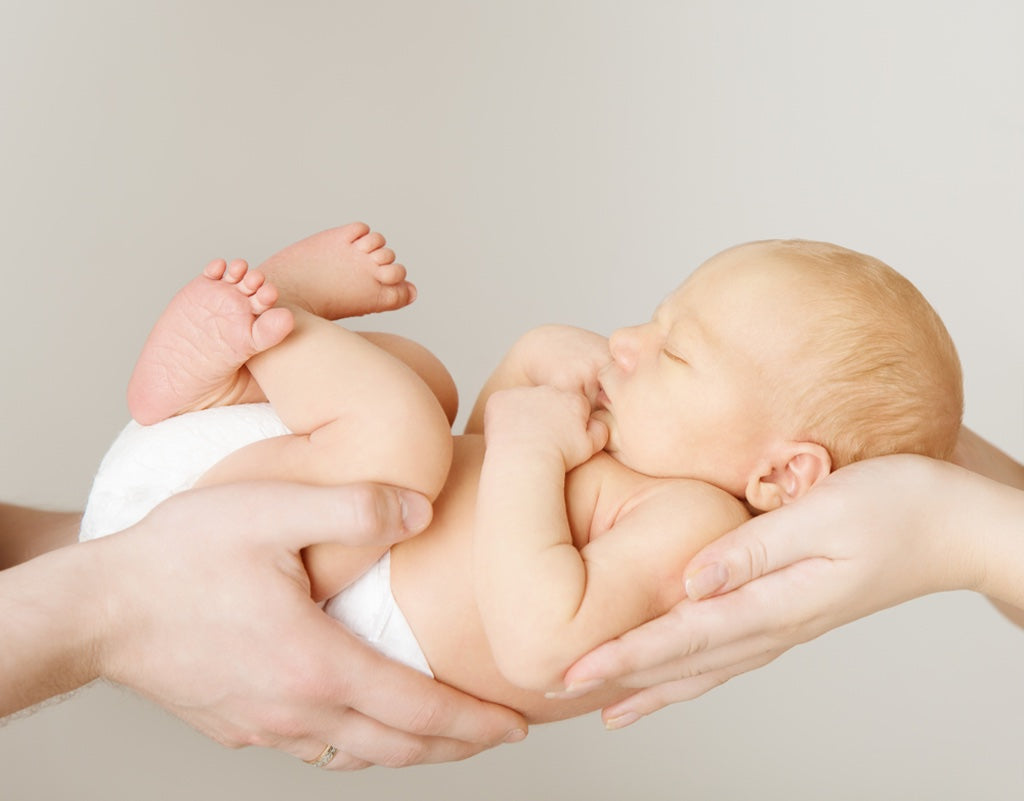 Newborn photo being taken for birth announcement