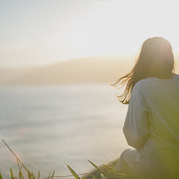 Woman spending time outside near water