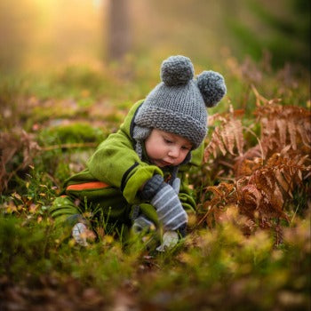 Baby with eczema-prone skin enjoying outside