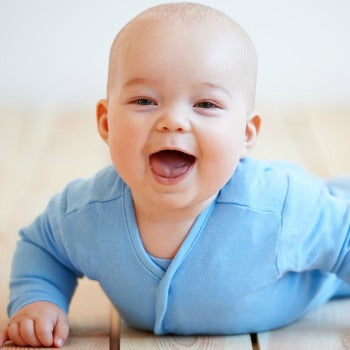 Baby on wood floors to prevent baby eczema flare-ups