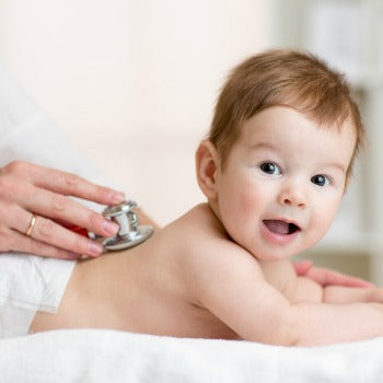 Baby visiting doctor for baby eczema