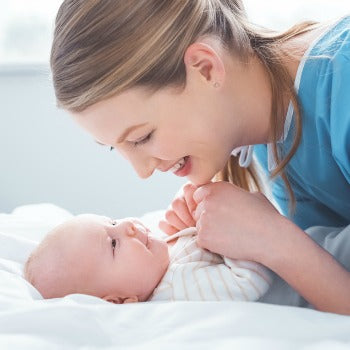 mother and baby bonding after treating baby heat rash