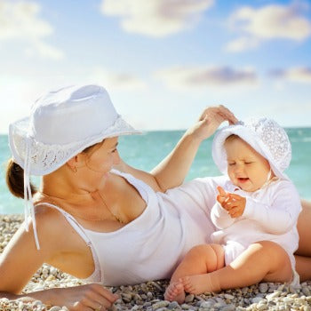 mother and baby relaxing in the sun