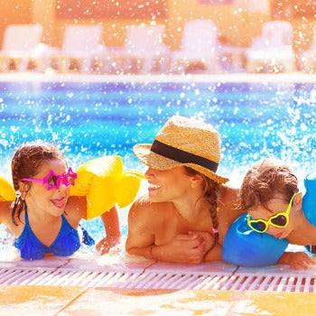 mother and children enjoying pool time despite eczema summer heat