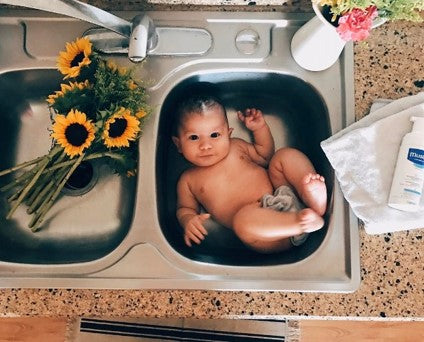 baby in sink