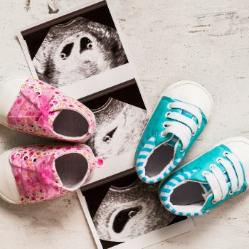 baby shoes pregnancy announcement twins