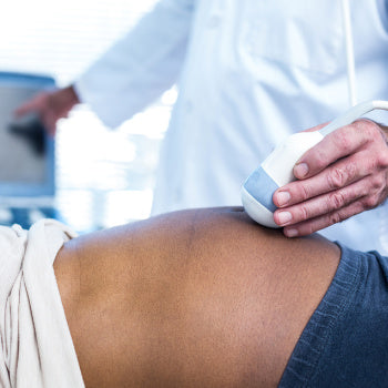 woman at her scheduled prenatal visit