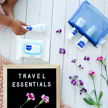 Mustela's Bebe On The Go kit that is extra handy for traveling with baby