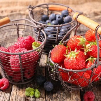 baskets of strawberries, blueberries, and raspberries