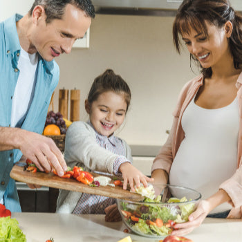 family cooking dinner together