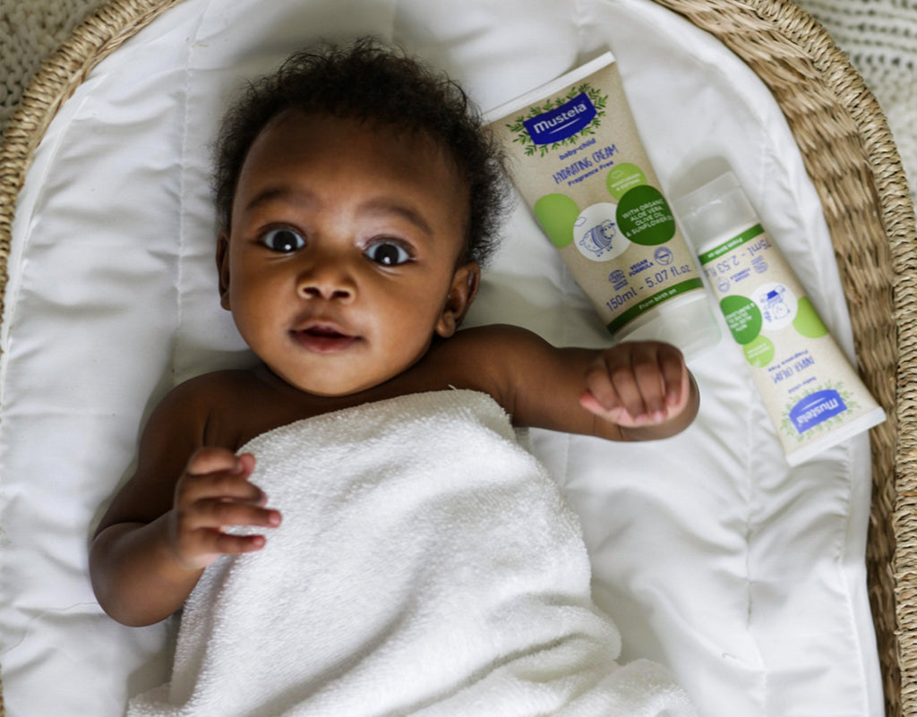 Baby with Mustela diaper products