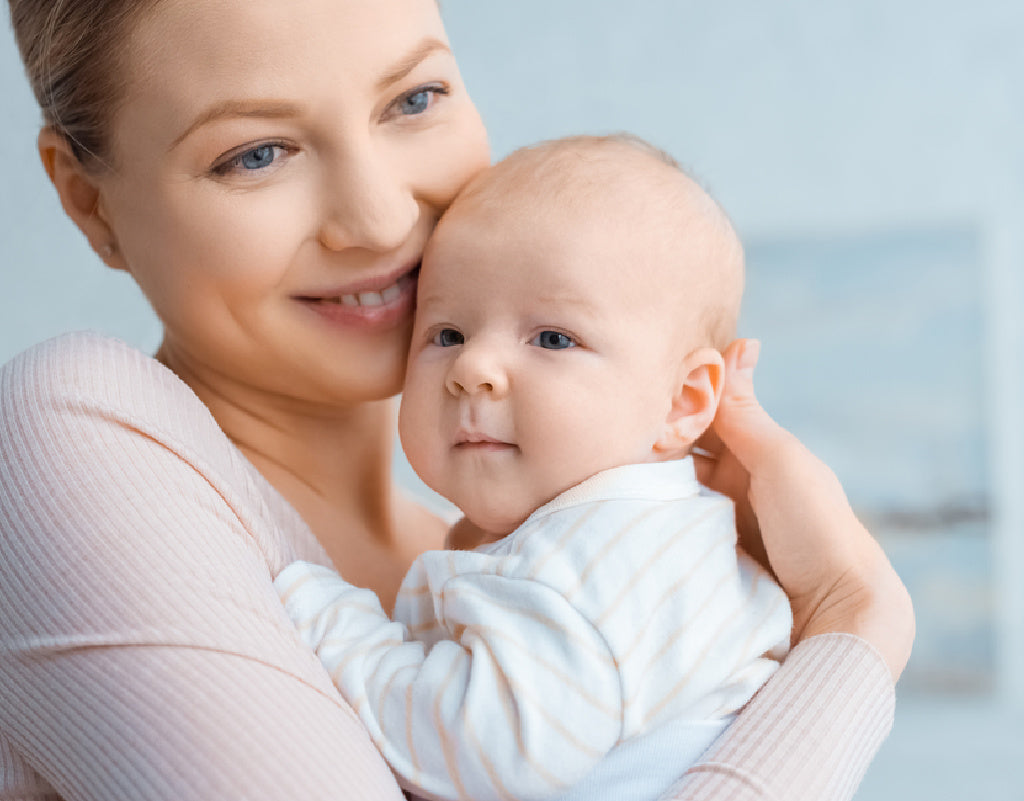 Mom holding her baby