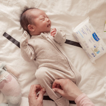 newborn baby getting changed