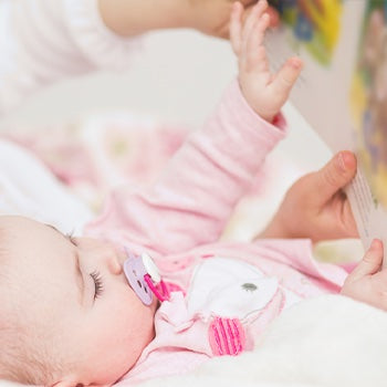 newborn with a pacifier