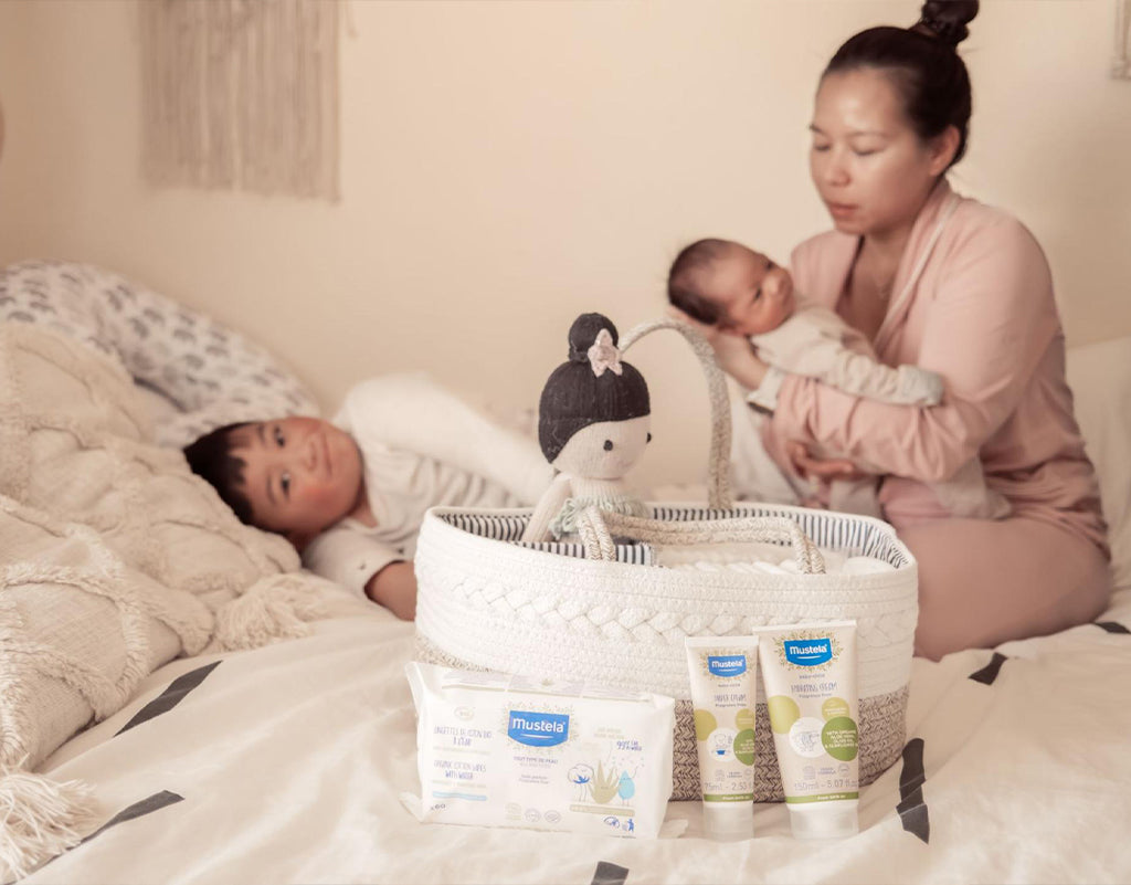 Mom prepared with products to help her nipples after breastfeeding