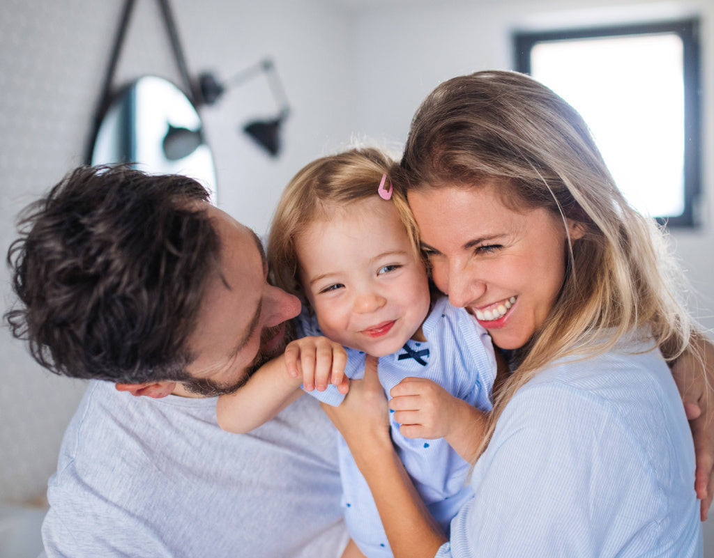 Happy family that uses natural skincare products