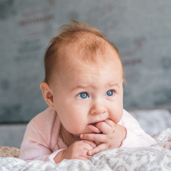 baby sucking on fingers