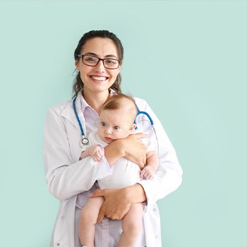 Doctor holding baby