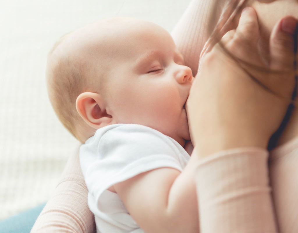 Mom breastfeeding baby