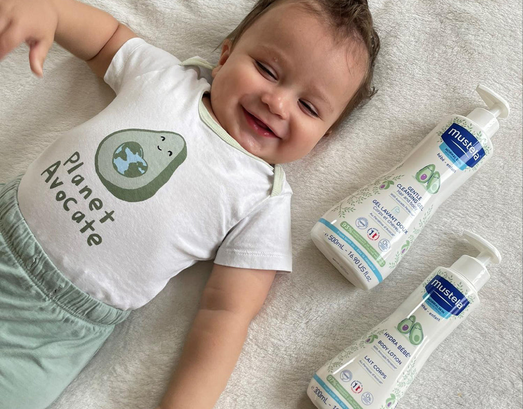 baby with lotion to protect skin barrier