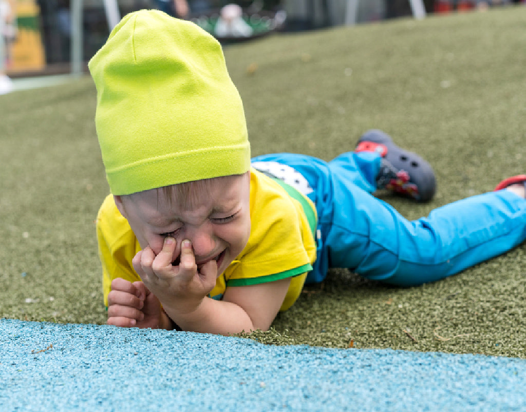 kid throwing a terrible twos tantrum