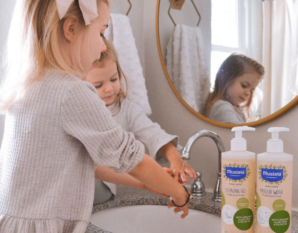 Child washing hands because parents know when to start potty training