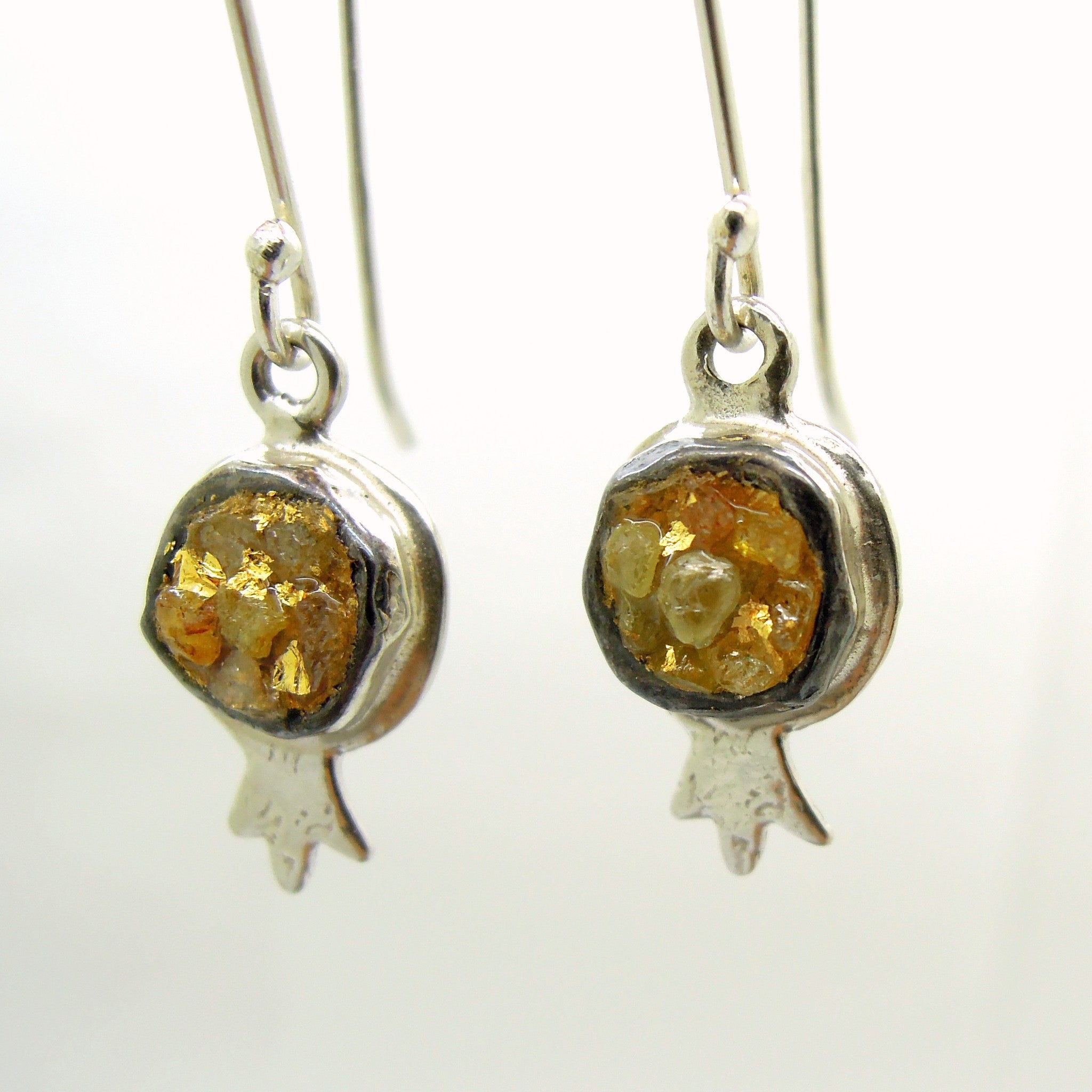 gold and silver dangle earrings