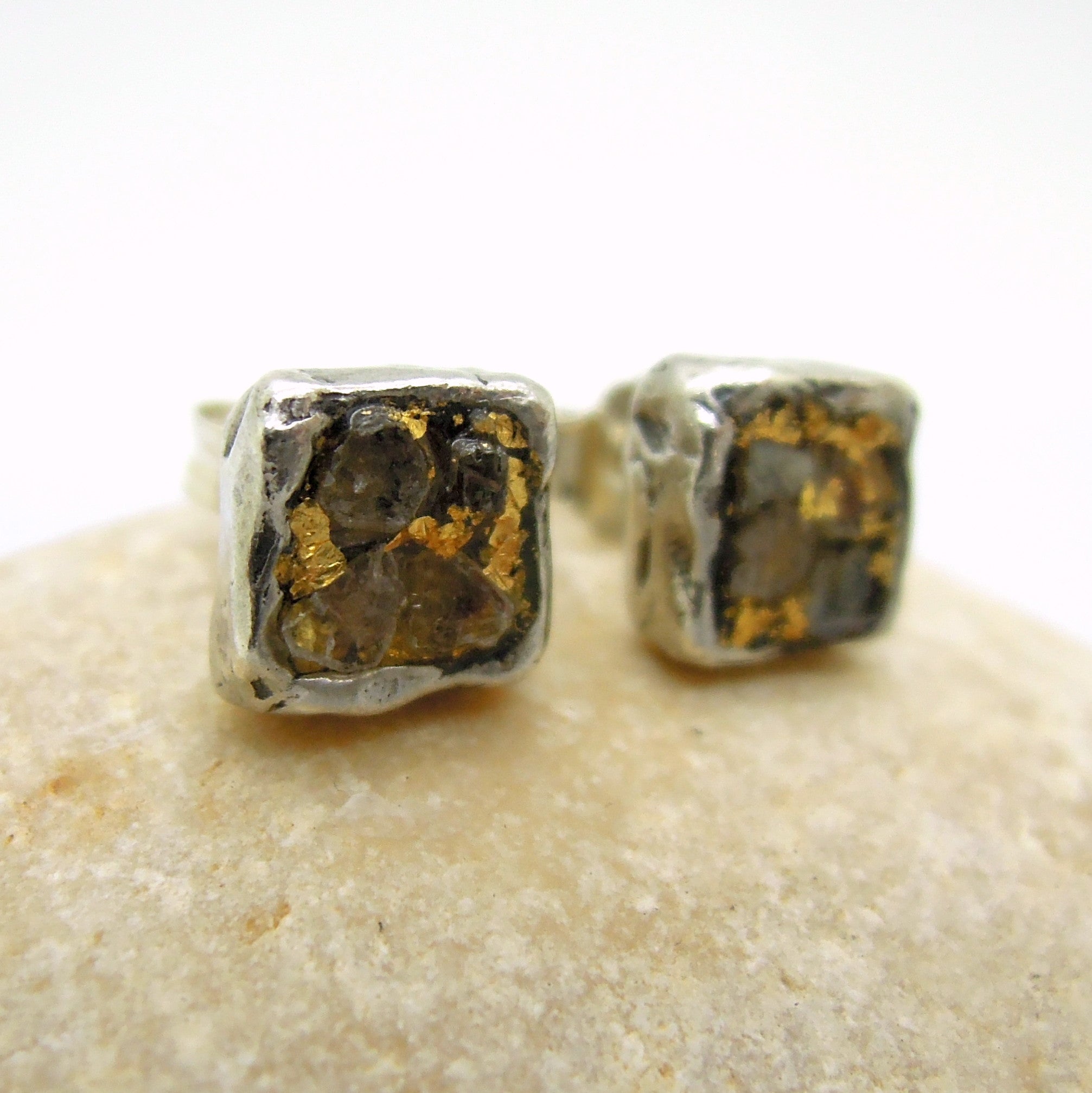 gold and silver studs