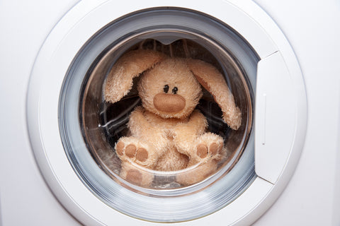 Soft toy rabbit in a front load washing machine