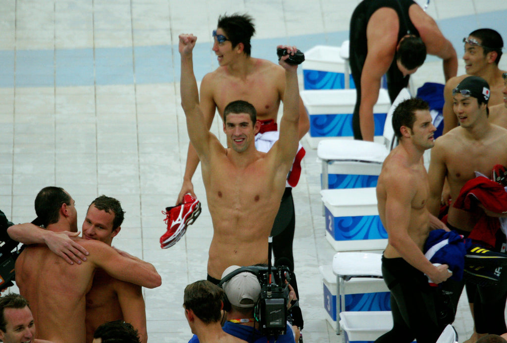 Swimmer Michael Phelps celebrates a win