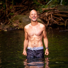 Dr. Dobias standing in the water after swimming