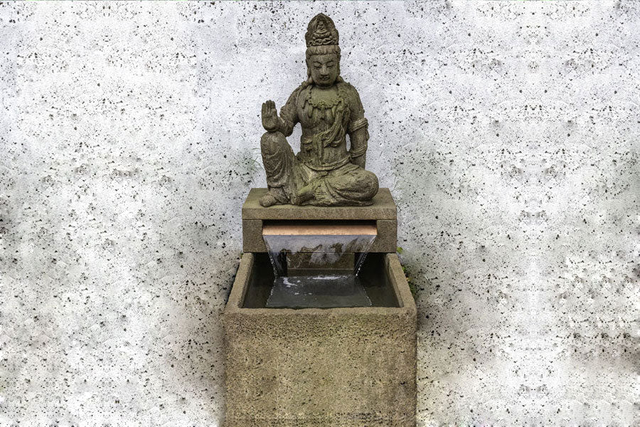 Antique Quan Yin Fountain in Aged Limestone in the backyard