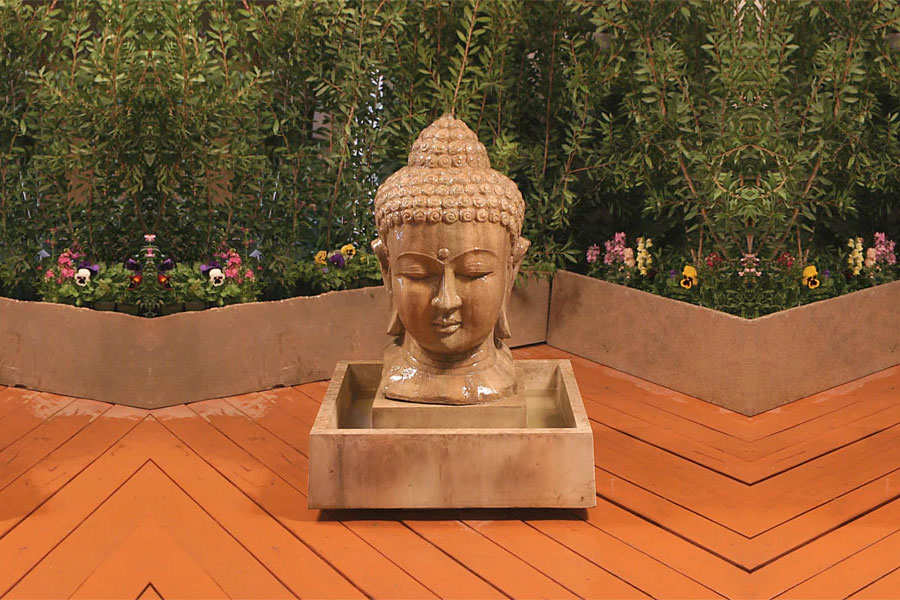 Buddha Head Fountain, Small in action in the backyard