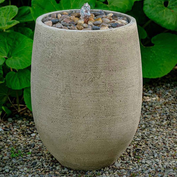 Campania International Bebel Pebble Fountain, Tall on gravel in the backyard