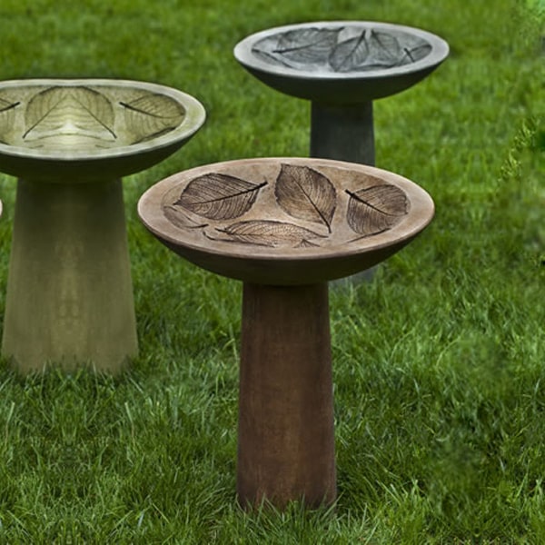 Campania International Hydrangea Leaf Birdbath on grass in the backyard