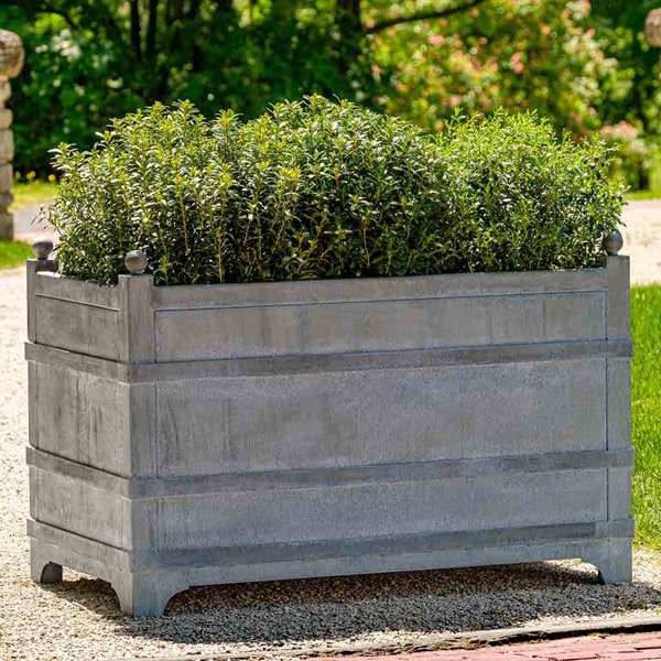 Campania International Manoir Rectangle Planter - Zinc - S/1 filled with plants in the backyard