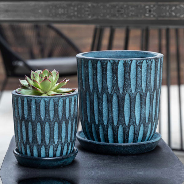 parabola-etched-blue-planter-set-of-8-filled-with-cactus-on-table