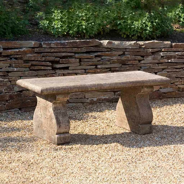 Campania International Provencal Bench on gravel in the backyard