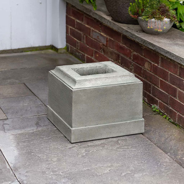 Campania International Rustic 12  Pedestal on concrete in the backyard