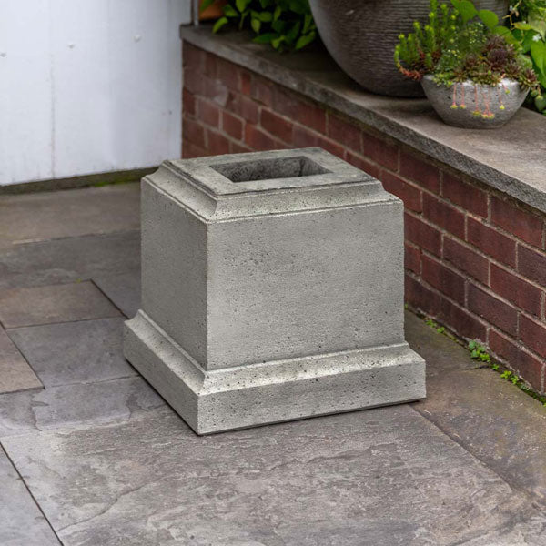 Campania International Rustic 16.5 Pedestal on concrete in the backyard