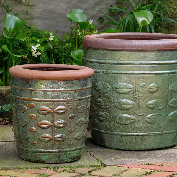 Campania International Rustic Leaf Pot - Rustic Green - Set of 2 on concrete in the backyard