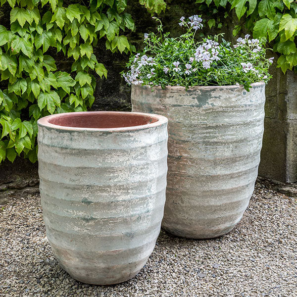 Campania International Sistina Planter - Vicolo Terra Set of 2 filled with flowers in the backyard